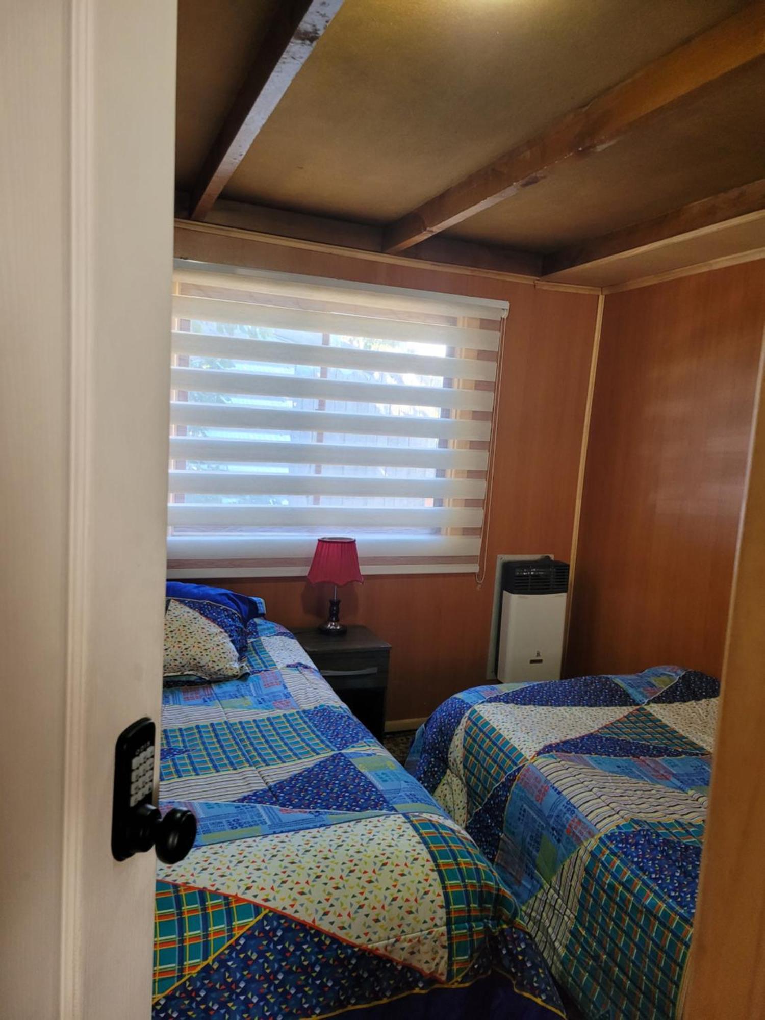 פורטו נטאלס Hostal Traveltour El Campesino מראה חיצוני תמונה